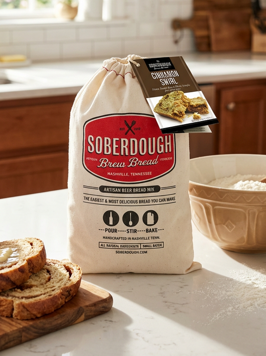 Bag of Soberdough bread mix on a kitchen counter with sliced bread and a bowl.