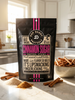 Bag of Pop Daddy Pretzels Cinnamon Sugar flavor on a kitchen counter with pretzel sticks and cinnamon.